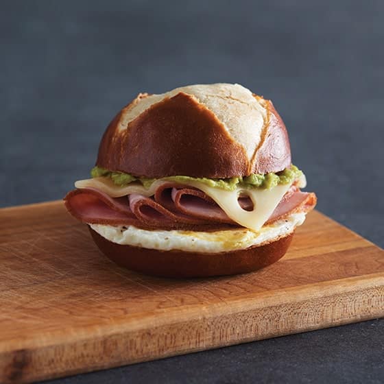 White Bison Ham Egg Swiss & Avocado Pretzel Sandwich